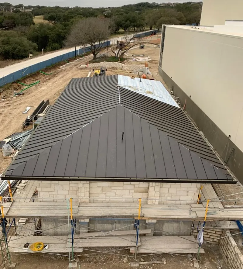 Metal roof new construction with scaffolding in St. Anthony